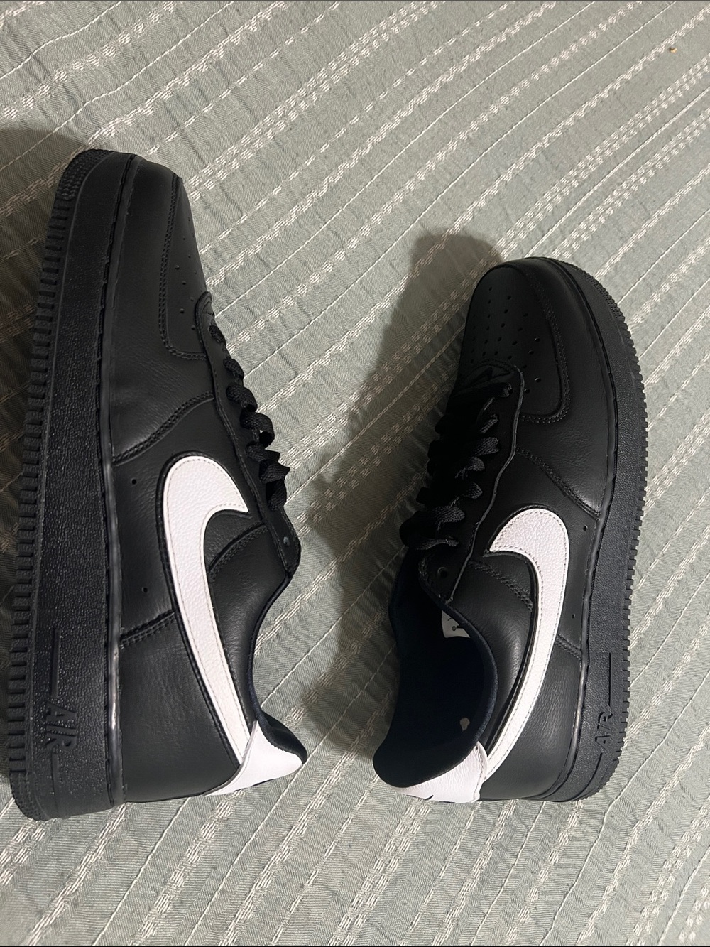 Nike Black Leather Low-Top Sneakers with White Swoosh